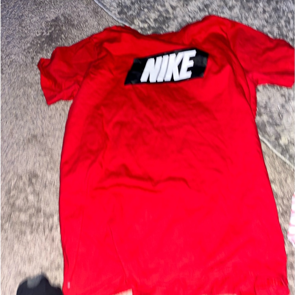 Red Nike shirt